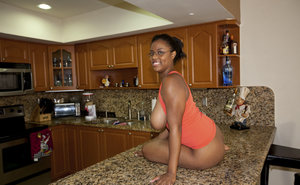 18 year old female Doris G slips off her underwear to pose naked on her bed